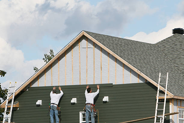 Professional Storm Damage Siding Repair technician working in Allenwood, PA